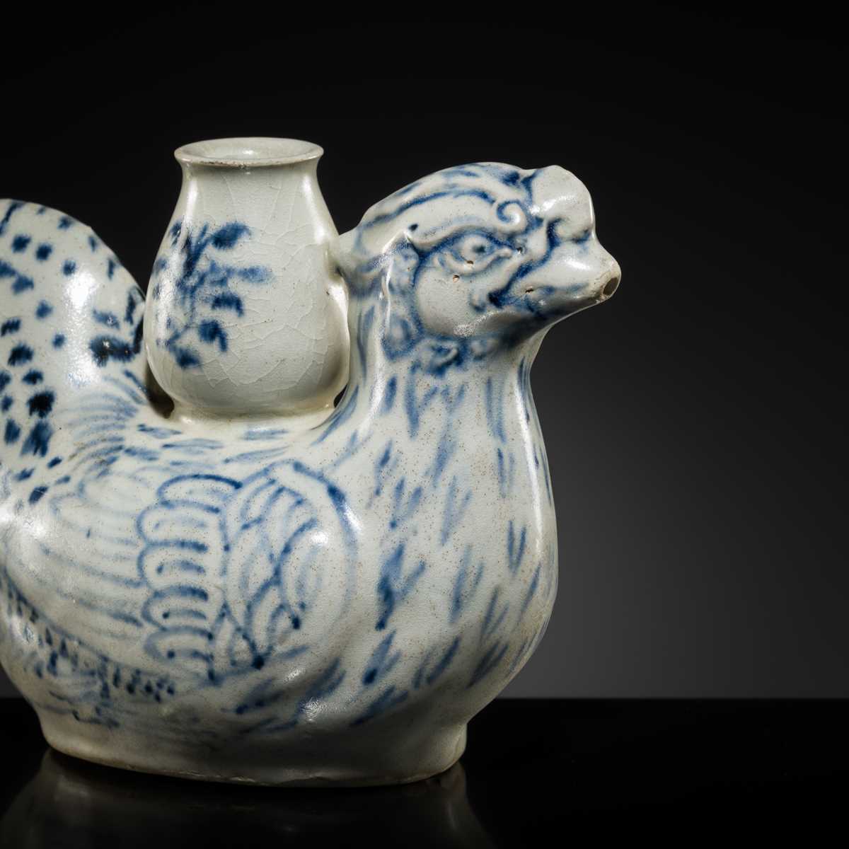 Lot 37 - A BLUE AND WHITE ‘COCKEREL’ EWER, LÊ DYNASTY, LATE 15TH CENTURY, FROM THE HOI AN HOARD