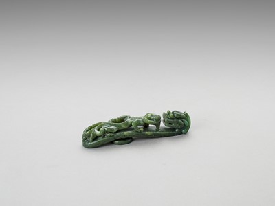 Lot 778 - TWO SPINACH GREEN JADE ‘DRAGON’ BELT HOOKS, LATE QING