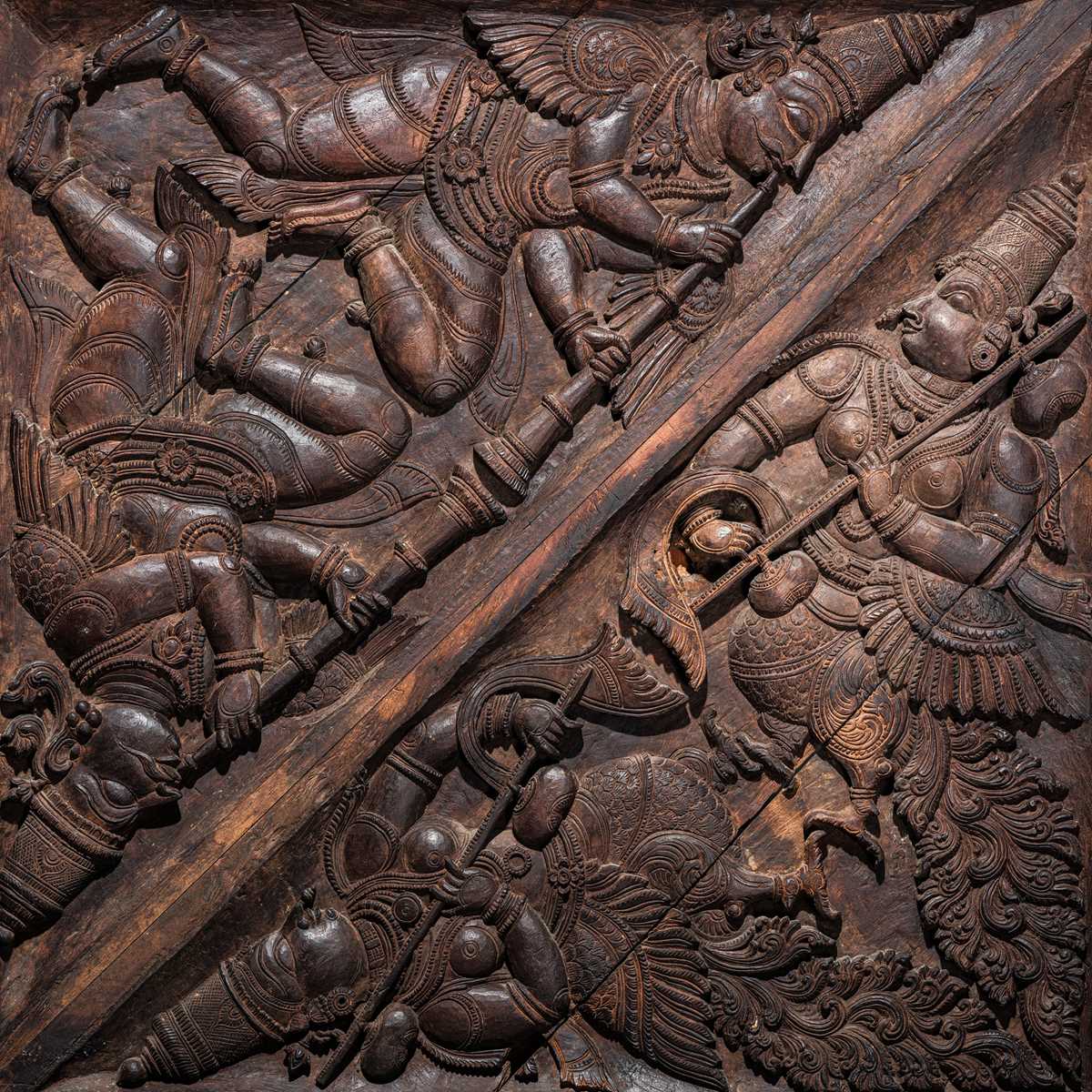 Lot 120 - A CARVED WOOD ‘KINNARA AND KINNARI’ TEMPLE CEILING PANEL, KERALA, CIRCA 18TH CENTURY