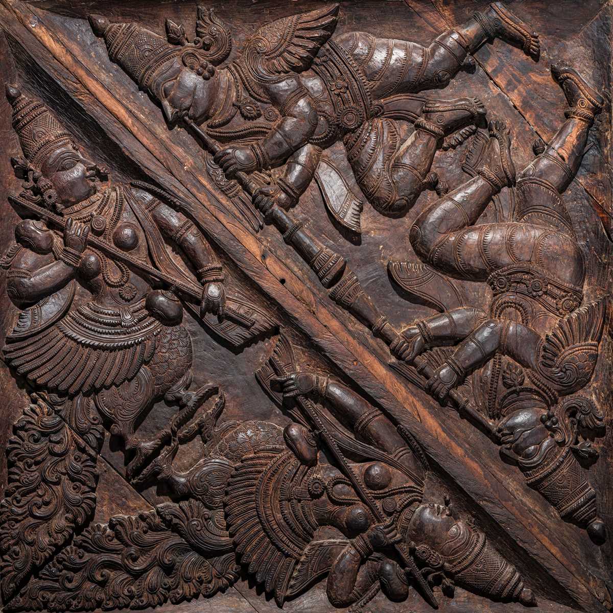Lot 121 - A CARVED WOOD ‘CELESTIAL MUSICIANS’ TEMPLE CEILING PANEL, KERALA, CIRCA 18TH CENTURY