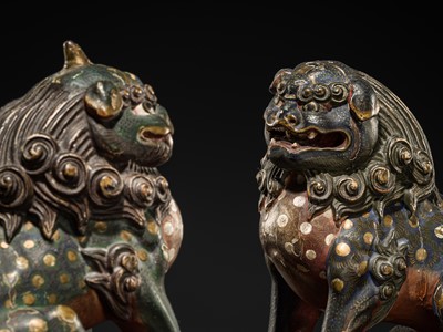 Lot 268 - A PAIR OF LACQUERED WOOD FIGURES OF KOMA INU, LATE EDO TO EARLY MEIJI PERIOD