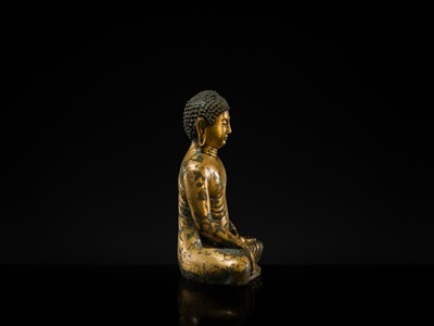 Lot 116 - A GILT-BRONZE FIGURE OF BUDDHA SHAKYAMUNI, UNIFIED SILLA PERIOD (668-935 AD), CIRCA LATE 9TH - EARLY 10TH CENTURY