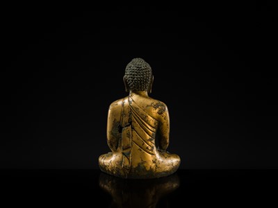 Lot 116 - A GILT-BRONZE FIGURE OF BUDDHA SHAKYAMUNI, UNIFIED SILLA PERIOD (668-935 AD), CIRCA LATE 9TH - EARLY 10TH CENTURY