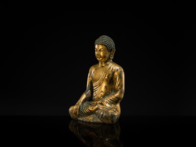 Lot 116 - A GILT-BRONZE FIGURE OF BUDDHA SHAKYAMUNI, UNIFIED SILLA PERIOD (668-935 AD), CIRCA LATE 9TH - EARLY 10TH CENTURY