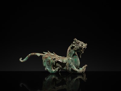 Lot 44 - A RARE AND IMPORTANT BRONZE FIGURE OF A BIXIE, HAN DYNASTY
