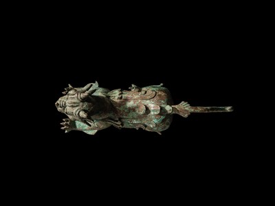 Lot 44 - A RARE AND IMPORTANT BRONZE FIGURE OF A BIXIE, HAN DYNASTY