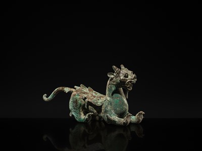 Lot 44 - A RARE AND IMPORTANT BRONZE FIGURE OF A BIXIE, HAN DYNASTY