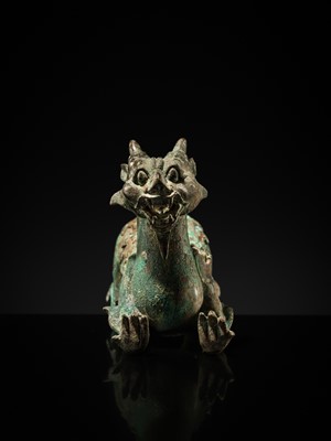 Lot 44 - A RARE AND IMPORTANT BRONZE FIGURE OF A BIXIE, HAN DYNASTY