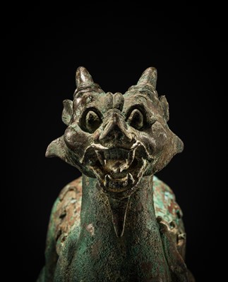 Lot 44 - A RARE AND IMPORTANT BRONZE FIGURE OF A BIXIE, HAN DYNASTY