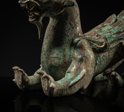 Lot 44 - A RARE AND IMPORTANT BRONZE FIGURE OF A BIXIE, HAN DYNASTY