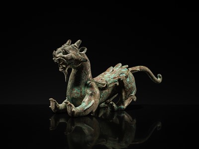 Lot 44 - A RARE AND IMPORTANT BRONZE FIGURE OF A BIXIE, HAN DYNASTY