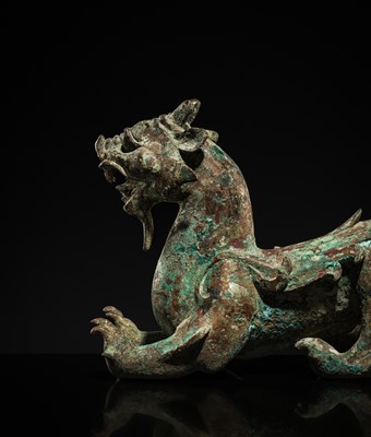 Lot 44 - A RARE AND IMPORTANT BRONZE FIGURE OF A BIXIE, HAN DYNASTY