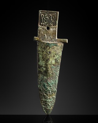 Lot 188 - AN ARCHAIC BRONZE DAGGER AXE, GE, SHANG DYNASTY