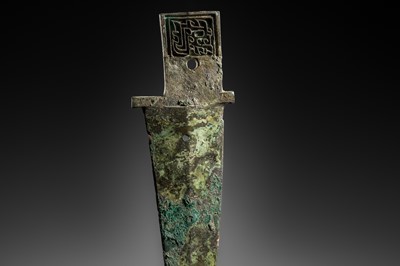 Lot 188 - AN ARCHAIC BRONZE DAGGER AXE, GE, SHANG DYNASTY