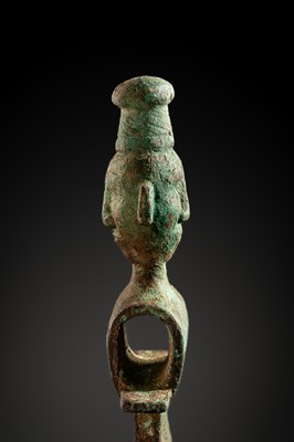 Lot 190 - A RARE BRONZE ‘COURTIER’ AXE-HEAD, WESTERN ZHOU DYNASTY