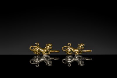 Lot 43 - A RARE PAIR OF GILT-BRONZE ‘TIGER’ GARMENT HOOKS, WESTERN HAN DYNASTY