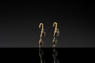 Lot 43 - A RARE PAIR OF GILT-BRONZE ‘TIGER’ GARMENT HOOKS, WESTERN HAN DYNASTY