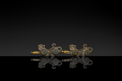 Lot 43 - A RARE PAIR OF GILT-BRONZE ‘TIGER’ GARMENT HOOKS, WESTERN HAN DYNASTY