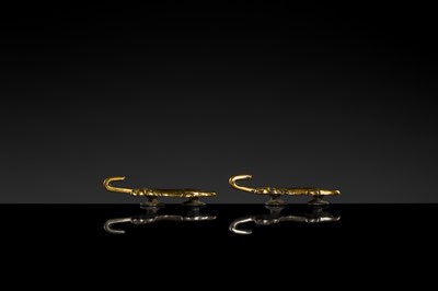 Lot 43 - A RARE PAIR OF GILT-BRONZE ‘TIGER’ GARMENT HOOKS, WESTERN HAN DYNASTY