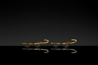 Lot 43 - A RARE PAIR OF GILT-BRONZE ‘TIGER’ GARMENT HOOKS, WESTERN HAN DYNASTY
