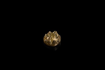 Lot 197 - A GILT-BRONZE TIGER-FORM ORNAMENT, HAN DYNASTY