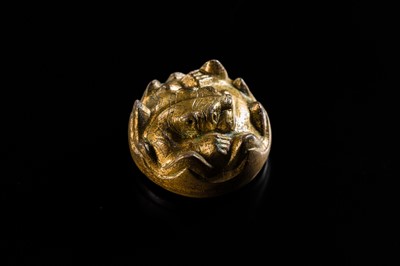 Lot 197 - A GILT-BRONZE TIGER-FORM ORNAMENT, HAN DYNASTY