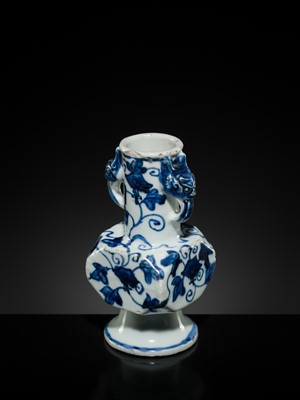 Lot 14 - A RARE BLUE AND WHITE ‘MORNING GLORY’ FACETED VASE, MING DYNASTY (1368-1644)
