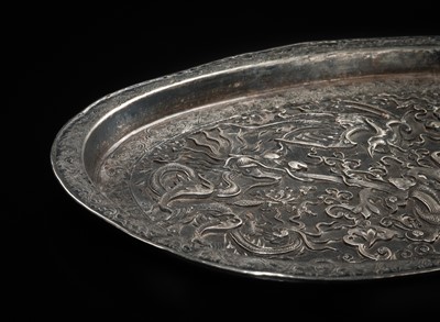 Lot 103 - A SILVER-REPOUSSÉ ‘FOUR SYMBOLS’ TRAY, SI XIANG, CHINA, 18TH-19TH CENTURY OR EARLIER