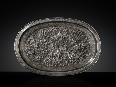 Lot 103 - A SILVER-REPOUSSÉ ‘FOUR SYMBOLS’ TRAY, SI XIANG, CHINA, 18TH-19TH CENTURY OR EARLIER