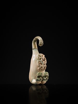 Lot 48 - A RARE AND FINE JADE AND GILT-BRONZE ‘DRAGON’ BELT HOOK, WESTERN HAN DYNASTY