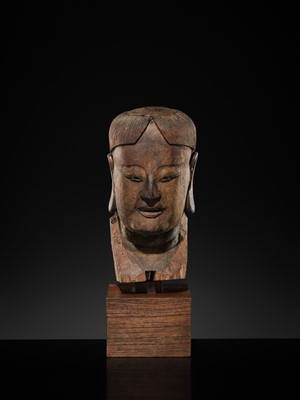 Lot 105 - A CARVED WOOD HEAD OF A BUDDHIST DISCIPLE, LATE MING TO EARLY QING DYNASTY