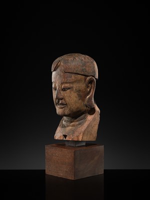 Lot 105 - A CARVED WOOD HEAD OF A BUDDHIST DISCIPLE, LATE MING TO EARLY QING DYNASTY