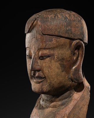 Lot 105 - A CARVED WOOD HEAD OF A BUDDHIST DISCIPLE, LATE MING TO EARLY QING DYNASTY
