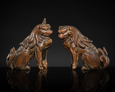 Lot 131 - A PAIR OF POLYCHROME WOOD FIGURES OF KOMA-INU, KAMAKURA PERIOD