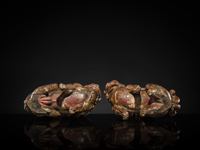 Lot 131 - A PAIR OF POLYCHROME WOOD FIGURES OF KOMA-INU, KAMAKURA PERIOD