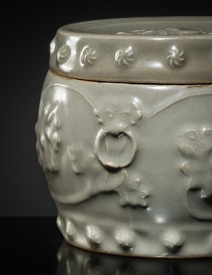 Lot 8 - A RARE LONGQUAN CELADON ‘PEONY’ BARREL-FORM JAR AND COVER, SOUTHERN SONG-YUAN DYNASTY