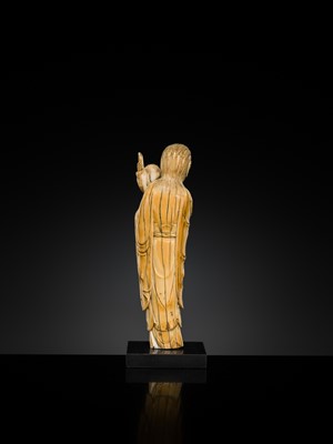 Lot 108 - AN IVORY FIGURE OF SONGZI GUANYIN AND CHILD, LATE MING DYNASTY