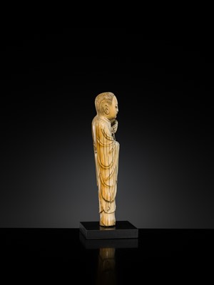 Lot 108 - AN IVORY FIGURE OF SONGZI GUANYIN AND CHILD, LATE MING DYNASTY