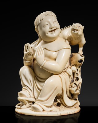 Lot 250 - AN IVORY FIGURE OF LIU HAI WITH A THREE-LEGGED BEAST, QING DYNASTY