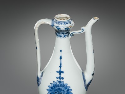Lot 166 - A SMALL BLUE AND WHITE EWER, LATE MING-EARLY QING DYNASTY