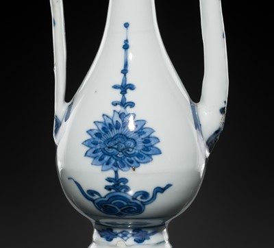 Lot 166 - A SMALL BLUE AND WHITE EWER, LATE MING-EARLY QING DYNASTY