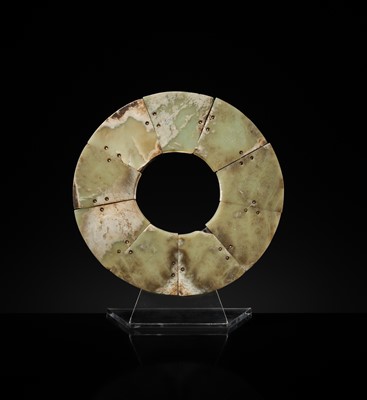 Lot 62 - A LARGE AND COMPLETE CELADON AND RUSSET JADE NINE-SECTION DISK, BI, LATE NEOLITHIC PERIOD-EARLY BRONZE AGE