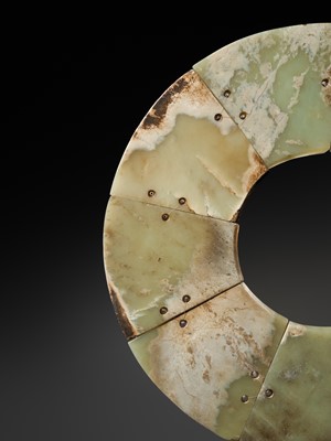 Lot 62 - A LARGE AND COMPLETE CELADON AND RUSSET JADE NINE-SECTION DISK, BI, LATE NEOLITHIC PERIOD-EARLY BRONZE AGE