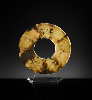 Lot 62 - A LARGE AND COMPLETE CELADON AND RUSSET JADE NINE-SECTION DISK, BI, LATE NEOLITHIC PERIOD-EARLY BRONZE AGE