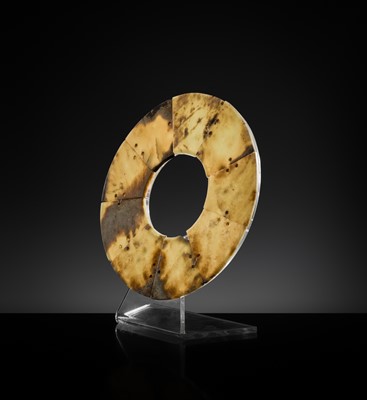 Lot 62 - A LARGE AND COMPLETE CELADON AND RUSSET JADE NINE-SECTION DISK, BI, LATE NEOLITHIC PERIOD-EARLY BRONZE AGE