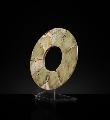 Lot 62 - A LARGE AND COMPLETE CELADON AND RUSSET JADE NINE-SECTION DISK, BI, LATE NEOLITHIC PERIOD-EARLY BRONZE AGE