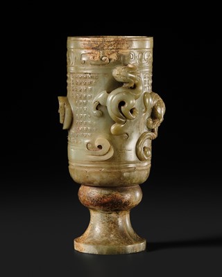 AN EXCEEDINGLY RARE CELADON JADE ‘DRAGON AND PHOENIX’ RITUAL STEM CUP, WESTERN HAN DYNASTY