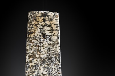 Lot 64 - A BLACK AND WHITE ‘STRIPED’ MARBLE AXE, YUE, LATE NEOLITHIC PERIOD-EARLY BRONZE AGE