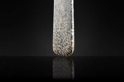 Lot 64 - A BLACK AND WHITE ‘STRIPED’ MARBLE AXE, YUE, LATE NEOLITHIC PERIOD-EARLY BRONZE AGE