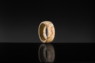 Lot 95 - A YELLOW AND RUSSET JADE ‘ROPE-TWIST’ BANGLE, HAN DYNASTY OR EARLIER